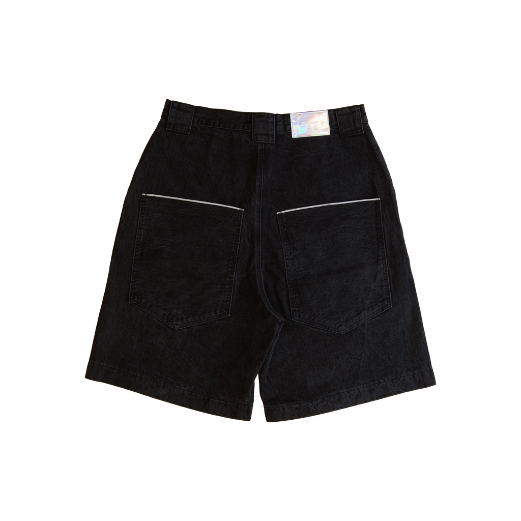 Big Denim Jhorts in black selvedge denim – back view with oversized patch pockets