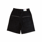 Big Denim Jhorts in black selvedge denim – back view with oversized patch pockets