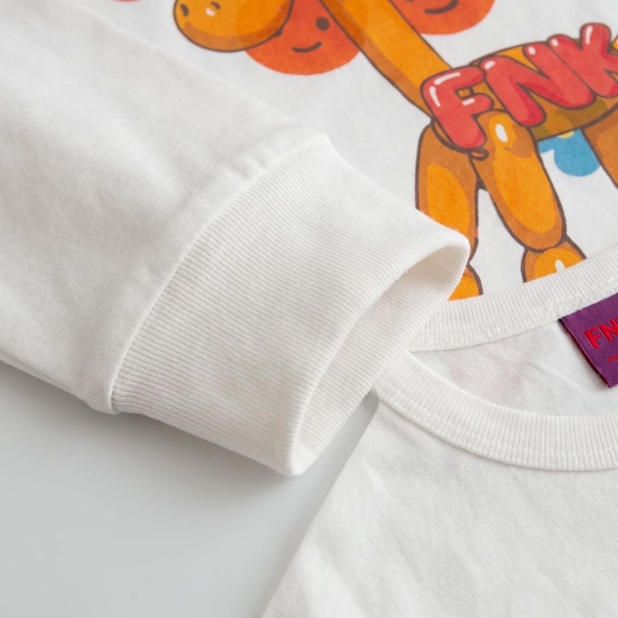 Sahara Monogram Longsleeve T Shirt – Close-up: collar, cuff, hem
